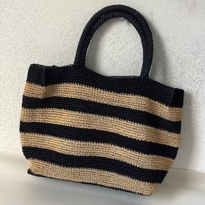 Woven natural & navy straw bag. Cotton lined with inside pocket.